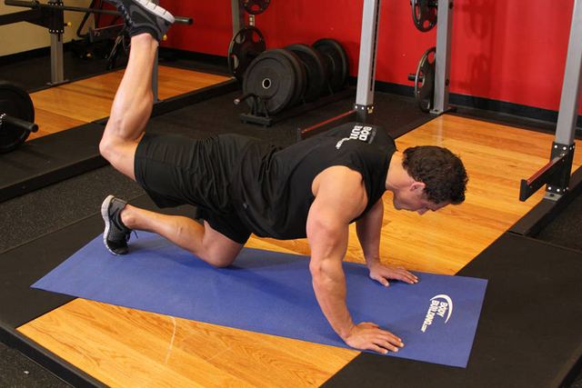 Donkey Kicks (Glute Kickbacks) – end position